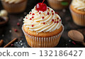 Deliciously decorated cupcake with a cherry on top 132186427