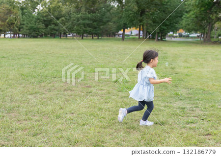 Infants playing in the park Infants playing in the park 132186779