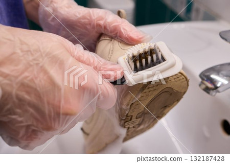 Cleaning Shoes with a Brush and Proper Care Techniques for Enhanced Longevity and Durability 132187428