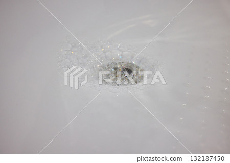 Sparkling Water Drain Riding With Floating Air Bubbles In A Peaceful Aquatic Scene 132187450