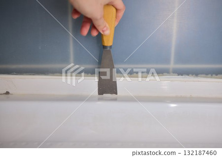 When embarking on home renovation, applying caulk with a putty knife is an essential skill When embarking on home renovation, applying caulk with a putty knife is an essential skill 132187460