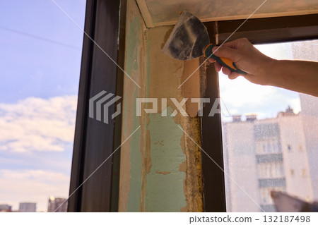 The Wall Repair Process Involves Properly Using Spackling Paste for a Quality Finish The Wall Repair Process Involves Properly Using Spackling Paste for a Quality Finish 132187498