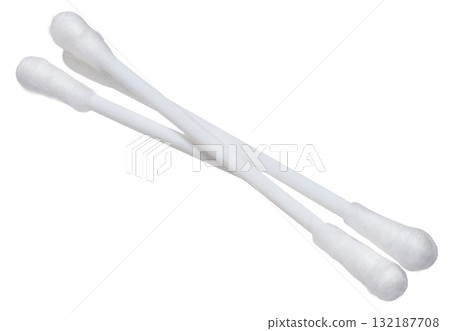 Cotton swabs for hygiene purposes on an isolated background. The swabs have a white plastic base and soft cotton tips on both ends. Cotton swabs for hygiene purposes on an isolated background. The swabs have a white plastic base and soft cotton tips on both ends. 132187708