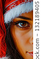 A close up of a woman wearing a santa hat 132189405