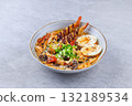 Traditional Japanese ramen with shrimp tempura, boiled egg, and vegetables 132189534