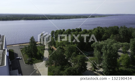 Volga river embankment greenery flourishing in spring sunshine. Clip 132190434