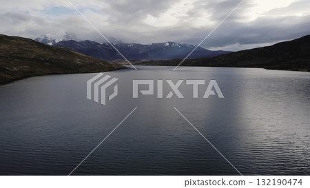 Scenic aerial view of patagonia lake and mountains. Media Scenic aerial view of patagonia lake and mountains. Media 132190474