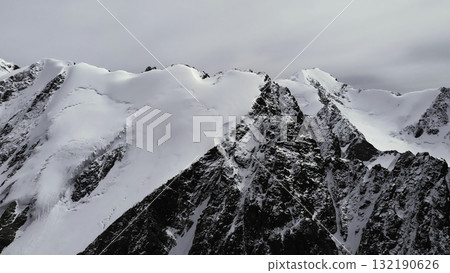 Snowy mountain peaks panning montage. Media Snowy mountain peaks panning montage. Media 132190626