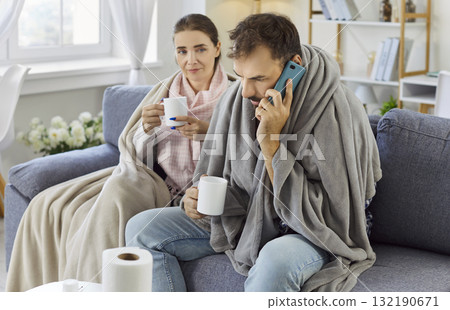 Phone call to doctor from husband about cough, runny nose, cold symptoms of couple 132190671