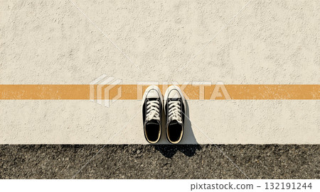 A minimalist composition of sneakers on the road symbolizing choice and boundaries 132191244