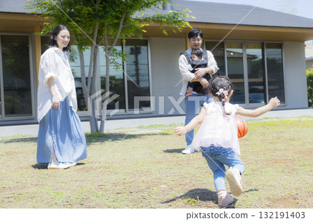Family playing in the garden Family playing in the garden 132191403