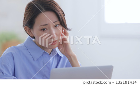 Tired woman with computer 132191414