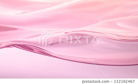 Luxurious moisturizing, anti-aging, skin care golden serum with pink water rippling in the background 132192467