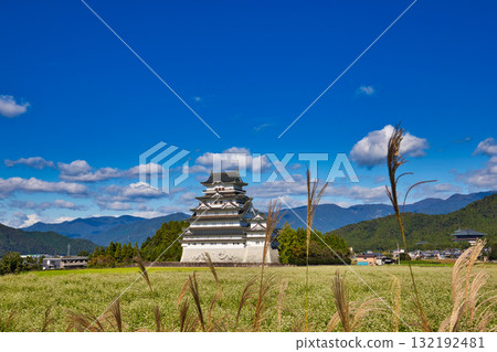 Katsuyama Castle shining against the blue autumn sky 132192481