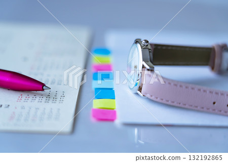 Calendar, documents, and watch on the table Calendar, documents, and watch on the table 132192865