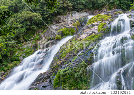 Graceful flowing waterfall, Okawa Falls, one of Japan's top 100 waterfalls, Yakushima National Park (Summer) Graceful flowing waterfall, Okawa Falls, one of Japan's top 100 waterfalls, Yakushima National Park (Summer) 132192921