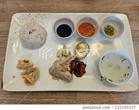 This is a set of hainanese chicken rice This is a set of hainanese chicken rice 132193337