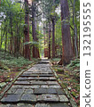 The stone steps of Mount Haguro surrounded by cedar trees The stone steps of Mount Haguro surrounded by cedar trees 132195555
