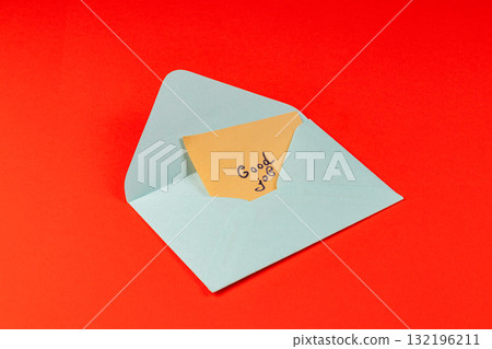 Colorful envelope with a message of encouragement on a red background Colorful envelope with a message of encouragement on a red background 132196211
