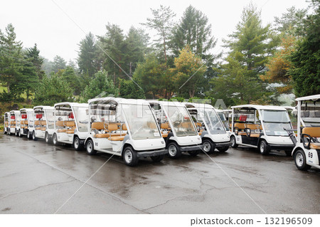 Golf cart parked in the parking lot Golf cart parked in the parking lot 132196509