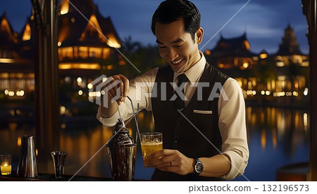 Smiling bartender mixing cocktail at lakeside bar at night Smiling bartender mixing cocktail at lakeside bar at night 132196573