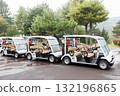 Golf cart parked in the parking lot 132196865