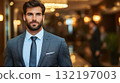 Confident businessman portrait formal attire indoor setting 132197003
