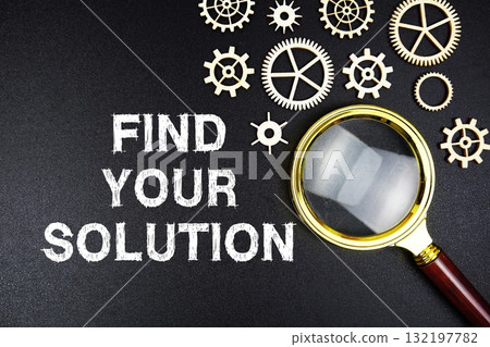 Find Your Solution text message with magnifying glass on black background Find Your Solution text message with magnifying glass on black background 132197782
