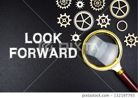 Look Forward text message with magnifying glass on black background Look Forward text message with magnifying glass on black background 132197793