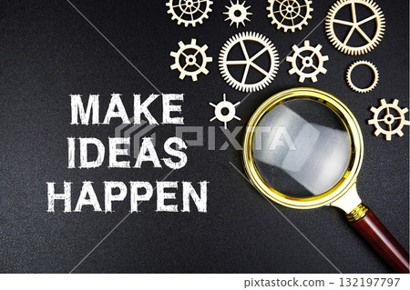 Make Ideas Happen text message with magnifying glass on black background 132197797