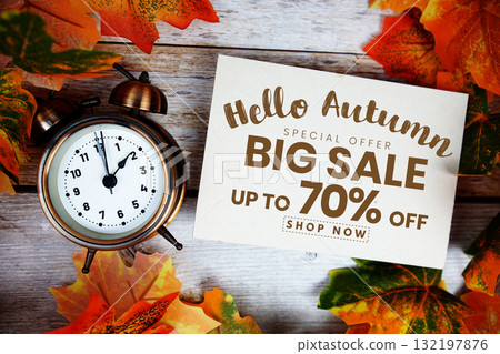 Hello Autumn Big Sale 70% off   Special Offer with maple leaf decoration on wooden background 132197876