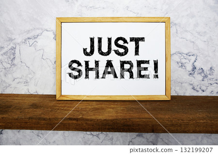 Just Share! text written on whiteboard with wooden shelf and marble background Just Share! text written on whiteboard with wooden shelf and marble background 132199207