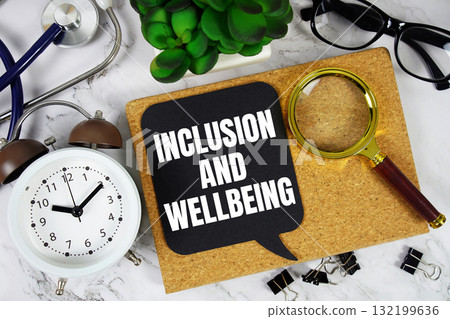 Inclusion And Wellbeing text with alarm clock, calculator and stethoscope on marble background Inclusion And Wellbeing text with alarm clock, calculator and stethoscope on marble background 132199636