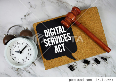 Digital Services Act text on speech bubble with alarm clock and wooden gavel on marble background Digital Services Act text on speech bubble with alarm clock and wooden gavel on marble background 132199663