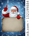 Santa Claus pointing up with a blank scroll on a snowy blue background Santa Claus pointing up with a blank scroll on a snowy blue background 132199884