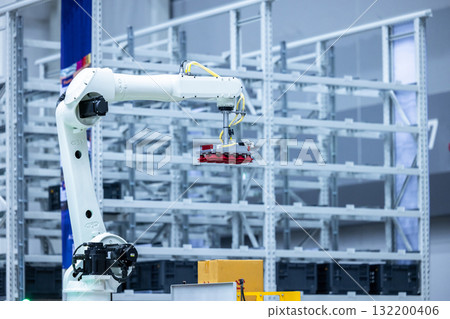 Robotic arm handling boxes on pallets in automated warehouse, Logistics warehouse automation robotics, Robotic arm automated factory packing system efficient industrial box handling and logistics 132200406