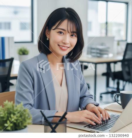 Young Japanese woman doing desk work in the office Young Japanese woman doing desk work in the office 132200940