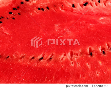 Close-up of the vibrant red flesh of a sliced watermelon. Close-up of the vibrant red flesh of a sliced watermelon. 132200988