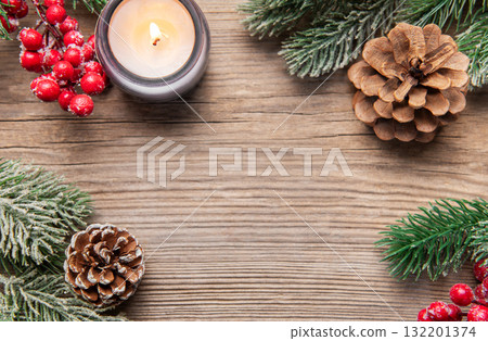 Christmas holidays border on rustic wood background Christmas holidays border on rustic wood background 132201374