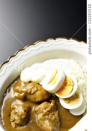 Chicken curry with boiled egg on a black background 132201518