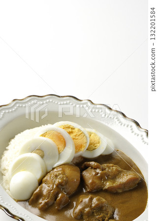 Chicken curry with boiled egg on white background 132201584