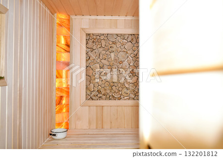 Interior of a traditional steam bath (sauna) with a wood-burning stove Interior of a traditional steam bath (sauna) with a wood-burning stove 132201812
