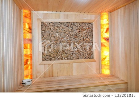 Interior of a traditional steam bath (sauna) with a wood-burning stove Interior of a traditional steam bath (sauna) with a wood-burning stove 132201813