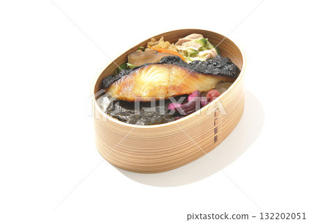 A bento lunch box with seaweed and grilled silver cod served in a bento box, photographed against a white background 132202051