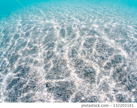 A half-submerged shot of Amuro Island's white sand beach. Zamami Port, Zamami Island, Kerama Islands, Shimajiri District, Okinawa Prefecture - 2025 A half-submerged shot of Amuro Island's white sand beach. Zamami Port, Zamami Island, Kerama Islands, Shimajiri District, Okinawa Prefecture - 2025 132203181