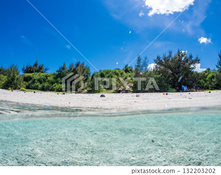 A half-submerged shot of Amuro Island's white sand beach. Zamami Port, Zamami Island, Kerama Islands, Shimajiri District, Okinawa Prefecture - 2025 132203202