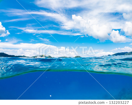 A half-submerged shot of Amuro Island's white sand beach. Zamami Port, Zamami Island, Kerama Islands, Shimajiri District, Okinawa Prefecture - 2025 132203227