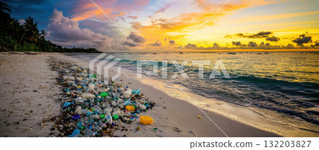 Polluted ocean shore with plastic waste, highlighting climate change impact 132203827