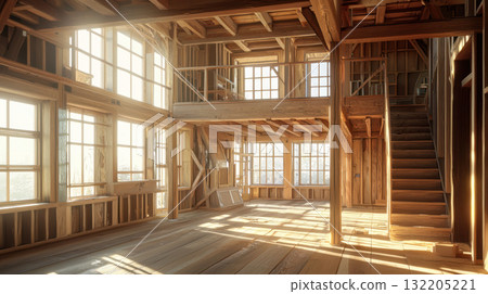 partially constructed wooden house interior with exposed timber framing, large windows, and wooden staircase. warm natural 132205221