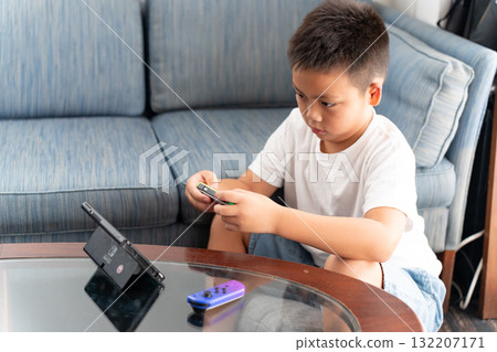  Boy playing games 132207171